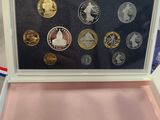 an image of a box of coins with a picture of a person holding it