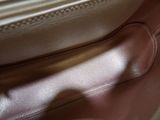 a close up of a piece of luggage that is sitting on the floor