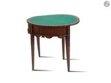 an image of a small table with a green top on a white background
