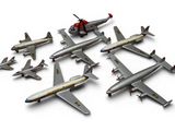 beaucoup d'avions regroupés sur une surface blanche