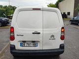 a white van parked on the side of the road