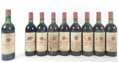 several bottles of wine are lined up in a row