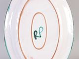 a plate with a number on it on a table