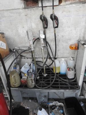 an image of a dirty bathroom with a lot of stuff on the floor