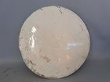 a large white bowl sitting on top of a table