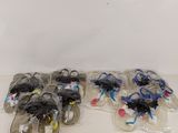 six paires de chaussures emballées dans des sacs en plastique