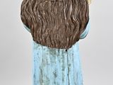 an image of a statue of a woman with long hair