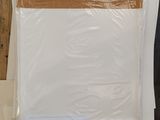several sheets of white paper are stacked on top of each other