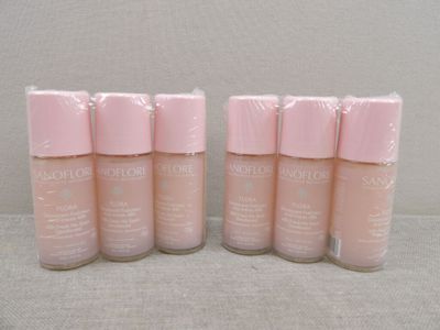 four bottles of maybe nude liquid foundation foundation makeup