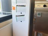 an image of a kitchen with a refrigerator and a dishwasher