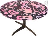 a table with a pink and black design on it