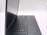 a laptop that is sitting on a white table