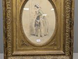 une vieille photo d'une femme à cheval, dans un cadre doré