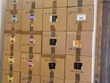 many boxes stacked on top of each other in a room