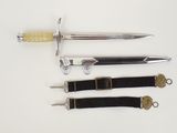 three different types of swords on a white surface
