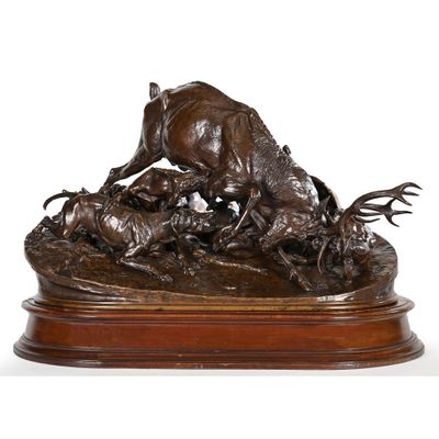 an image of a bronze sculpture of a deer and her cubs