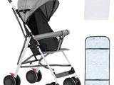 a baby stroller with a stroller and accessories on a white background