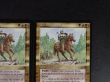 two cards with a picture of a man riding a horse