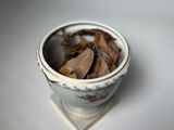 a small bowl of food that is sitting on a table