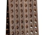 a wooden wine rack that has holes in it
