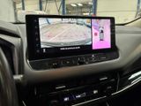 dashboard view of a car with a gps device on the dashboard
