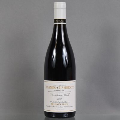 a bottle of wine that is sitting on a table