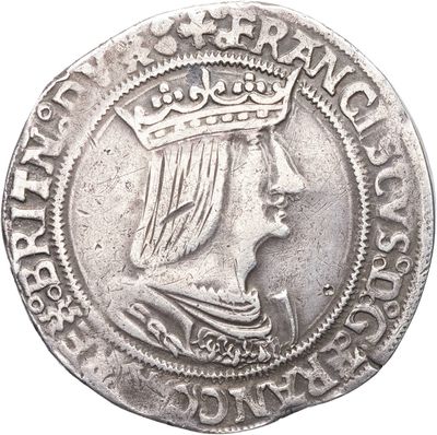 a close up of a silver coin with a crown on it