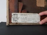 a person holding a piece of paper with a picture on it