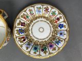 pair of antique porcelain dishes with gold trim and floral decoration