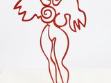 an image of a red sculpture of an angel on a white surface