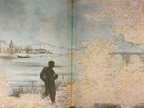 a picture of a book with a picture of a man standing in front of a map
