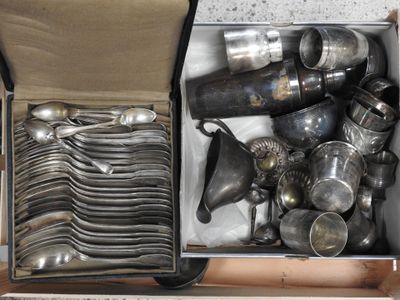 a box full of silverware sitting on a table
