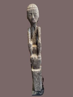 an image of a statue of a man with a hat on his head