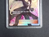 a picture of a card with a picture of a woman in a black dress