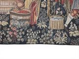 a picture of a tapestry of a woman and a man in a garden