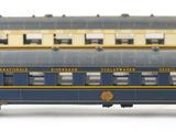 a blue and yellow train car on a white background
