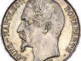 Gros plan sur une pièce de monnaie portant le visage d'un homme