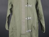 an image of a military coat on a mannequin