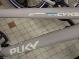 a close up of a bicycle with a sticker on it