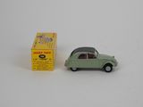 an image of a small toy car next to a box of cigarettes