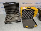 three different types of tools in a plastic case on a table