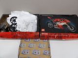 two boxes of legos on a table with a box of tissues