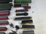a lot of toy trains sitting on a table
