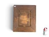 a picture of an old wooden picture frame on the wall