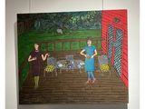 a painting on the wall of a room with a painting of a woman and a man