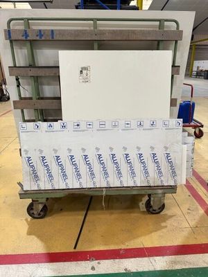 a cart that has a lot of boxes on it