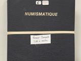 a close up of a book with a sticker on it