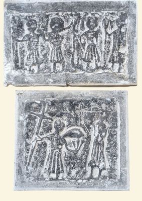 two silver plaques with figures on them, one of which is a horse and the other of which is a