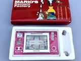 a red and white electronic game in a box