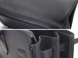 a picture of a black purse with a gold buckle